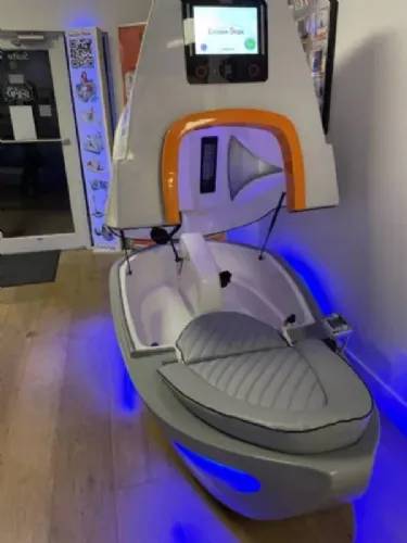 Infra Bike with open-top design, touchscreen display, and blue LED lighting