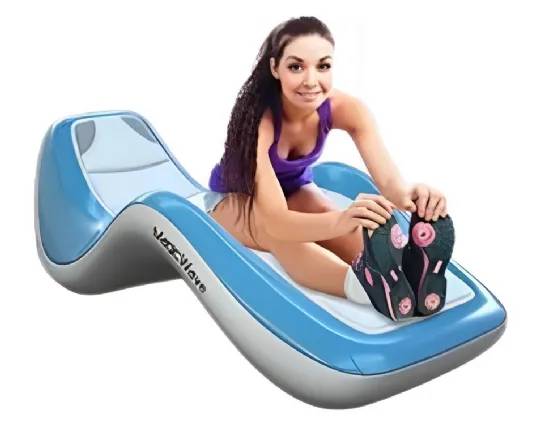 Ergonomic blue massage chaise lounge with a woman stretching