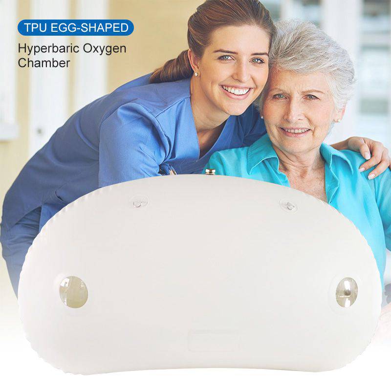 Nurse hugging elderly woman near Oxyair 1.5 ATA hyperbaric chamber