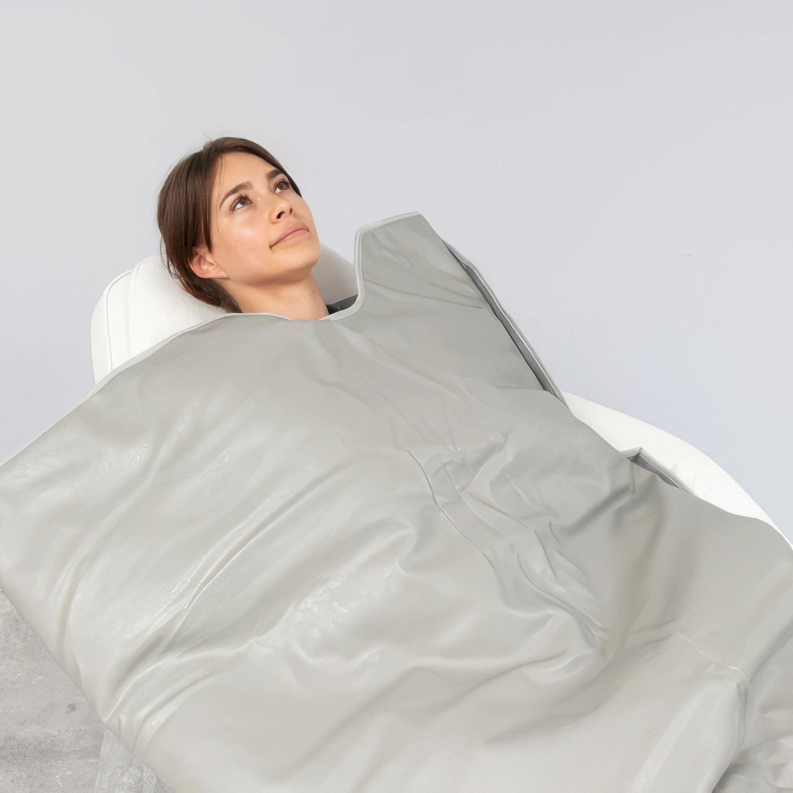 Relax comfortably inside the Carbon Sauna 3 Zone Blanket during a personalized far infrared heat therapy session