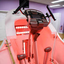 Interior view of the Swan Infra Shaper Classic showcasing the elliptical trainer, infrared light panels, and user-friendly control console.