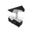 Image 1: Black and silver wellness therapy bed with a clear acrylic surface, overhead canopy, patterned panels, and caster wheels.