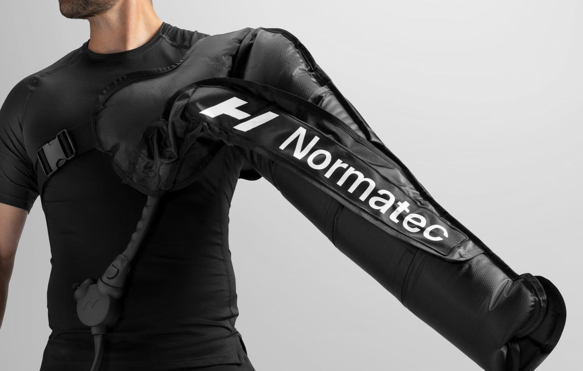 Hyperice Normatec 3 Full Body with the arm attachment.