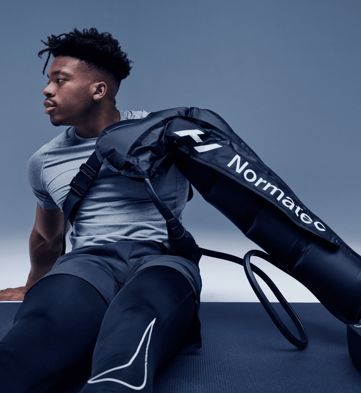 Hyperice Normatec 3 Full Body with the arm attachment.