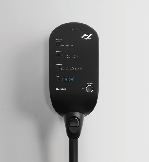 Hyperice Normatec 3 Full Body with its control unit.