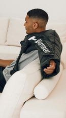 Hyperice Normatec 3 Full Body worn during use.