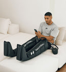 Hyperice Normatec 3 Full Body worn during use.