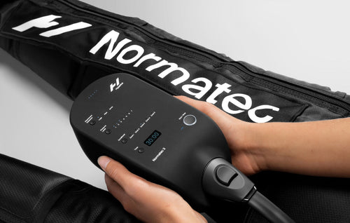 Hyperice Normatec 3 Legs with its control unit.