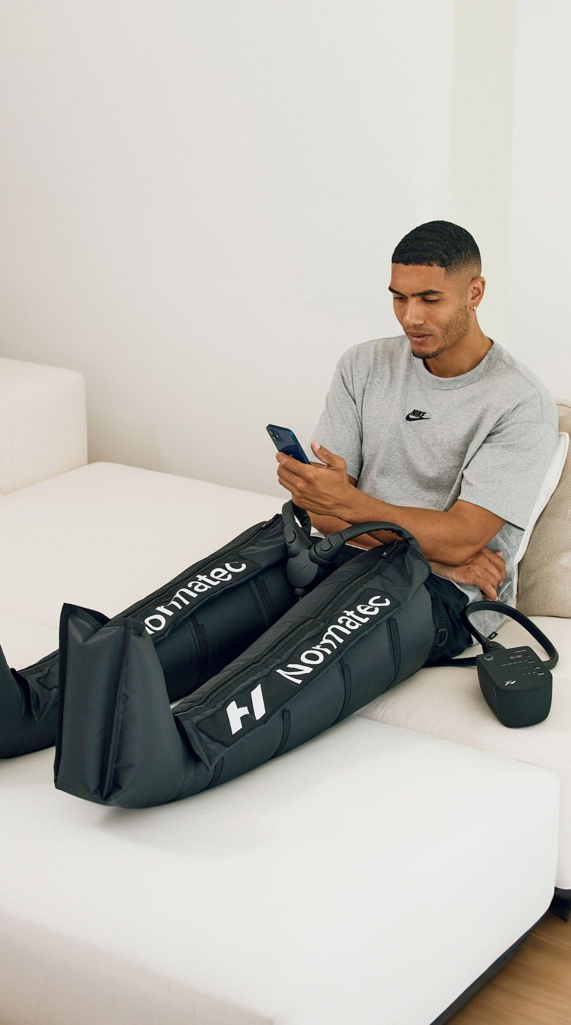 Hyperice Normatec 3 Legs worn during use.
