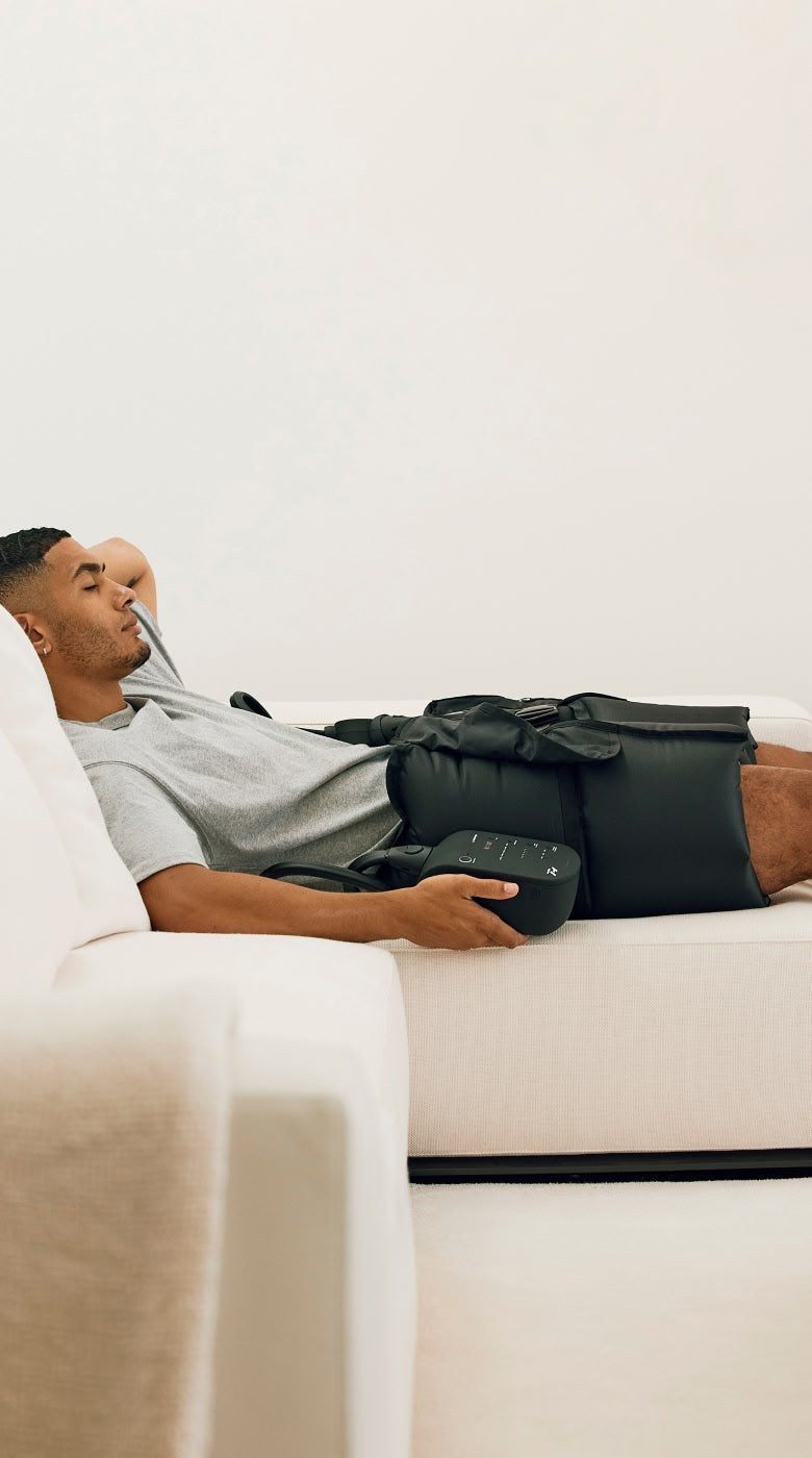Hyperice Normatec 3 Lower Body worn during use.