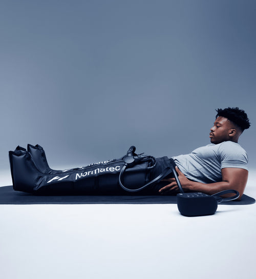 Hyperice Normatec 3 Lower Body worn during use.