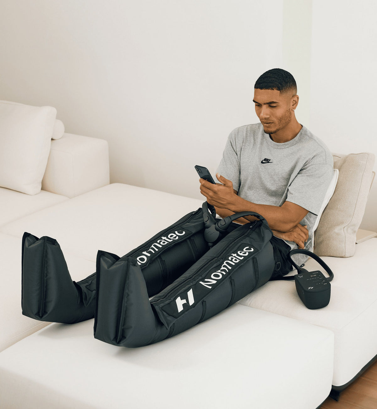 Hyperice Normatec 3 Lower Body worn during use.