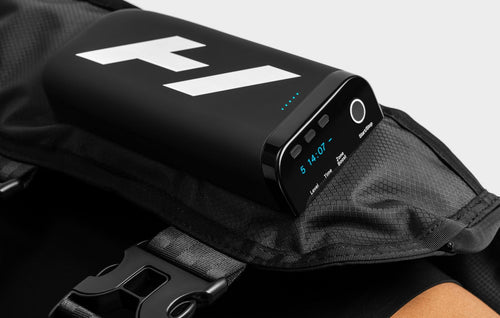 Hyperice Normatec Elite Hips with its control unit.