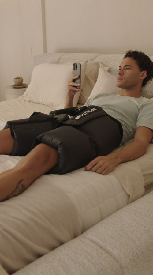 Hyperice Normatec Elite Hips worn during use.