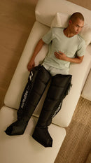 Hyperice Normatec Elite Legs worn during use.