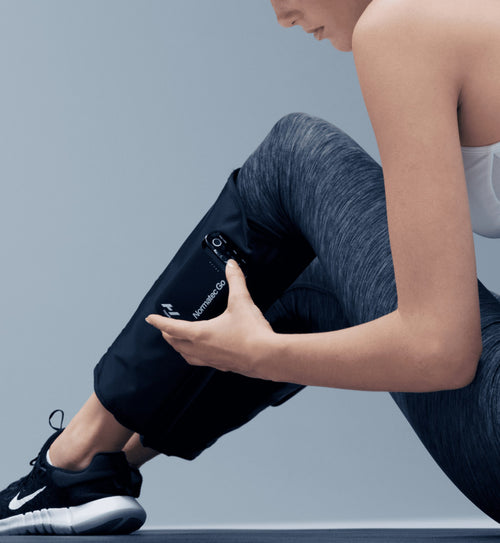 Hyperice Normatec Go worn during use.