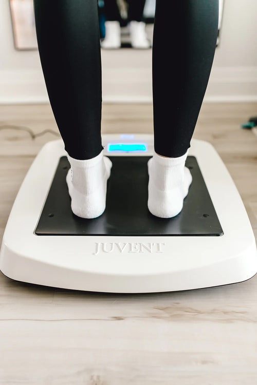 Close up of the Juvent 1000N platform with a woman's feet standing on the device.
