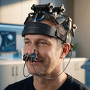 Close-up of a man wearing the Neuro Pro 2 brain stimulation device, featuring the intranasal gateway and the transcranial LED headset.
