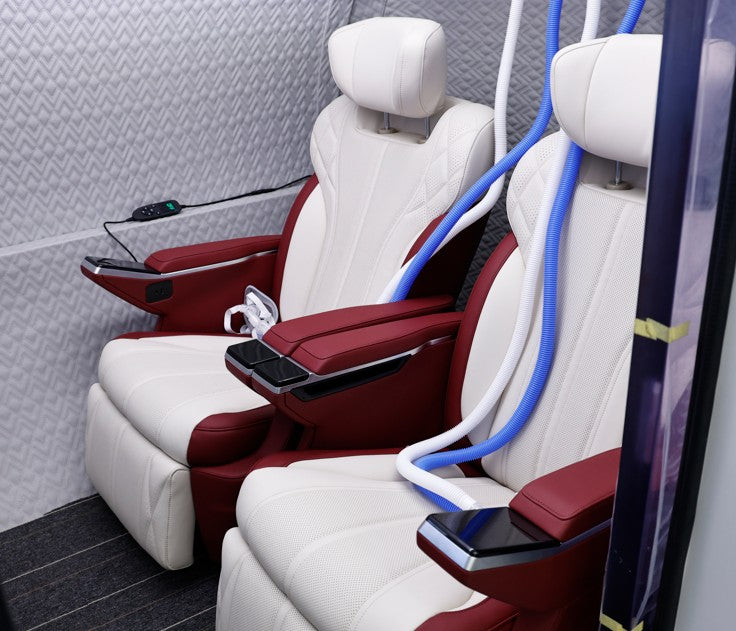 Oxyair YZM02 interior with two electric massage sofas and BIBS oxygen hoses