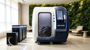 Oxyair YZM02 hyperbaric chamber shown in a bright wellness lobby with its support equipment
