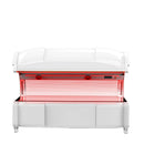 Front view of the TheraLaser red light therapy chamber open, showing the high-density LED panels and internal cooling fans.