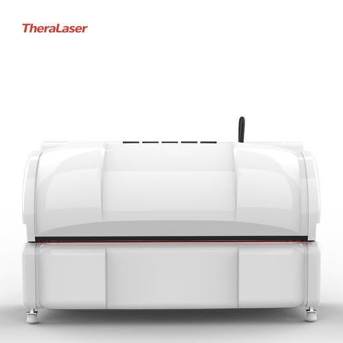 Front profile of the TheraLaser photobiomodulation chamber in its closed position, highlighting the sleek white professional design.