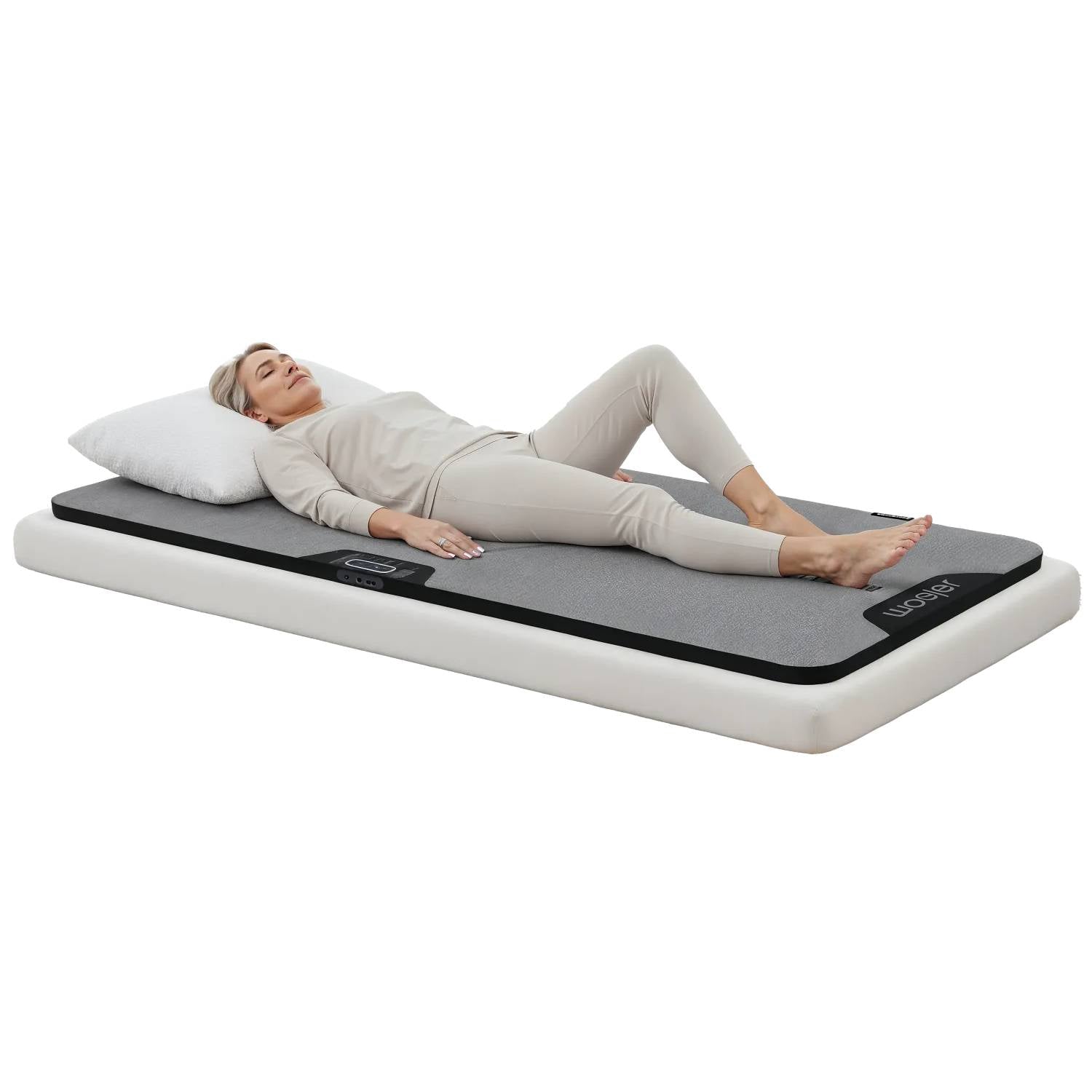 Transform your bed into a relaxing recovery space with the Woojer Sound Therapy Bed Mat